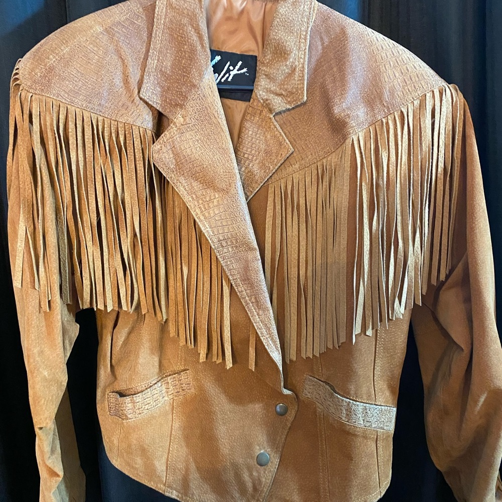Vintage chestnut colored fringe leather jacket